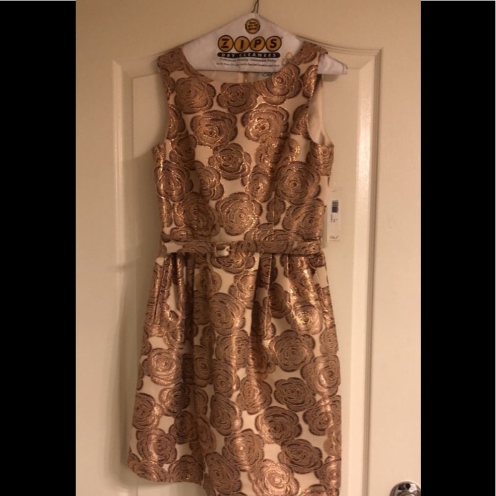 gold tan mini dress with gold floral print